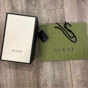 Gucci paper bag, gift box, and gift receipt holder